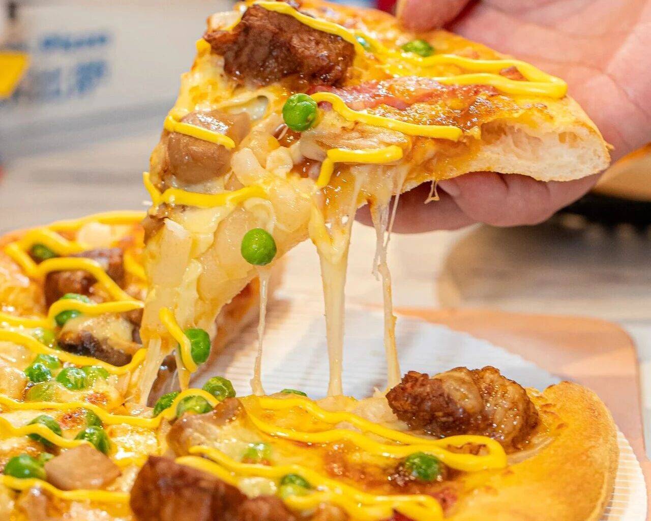 真香预警!达美乐指定比萨限时“买1送1”